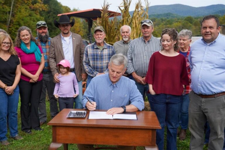North Carolina governor signs bill to suspend state gas tax and reduce costs for residents
