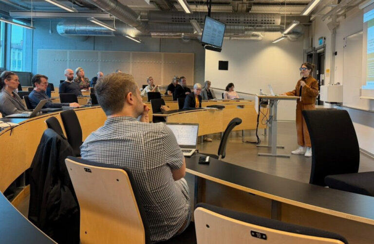 UNC Charlotte team promotes AI literacy in STEM education at Malmö University, showcases Niner Ghost Bus and encourages voting
